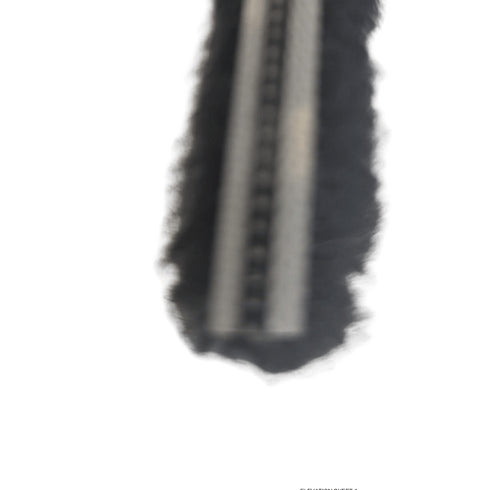 Close-up of a black bristle brush on a white background